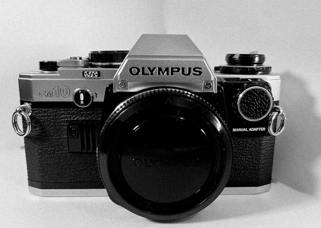 Olympus OM-10 front view with Manual Adapter