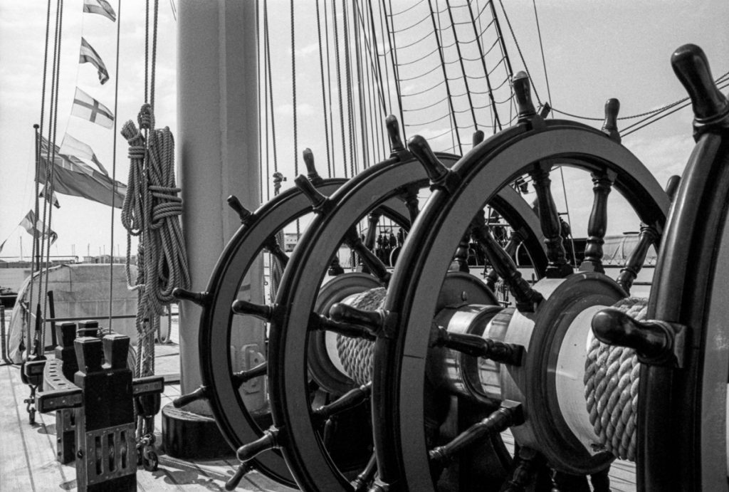 twin wooden ship wheels side by side hms warrior zuiko 28mm