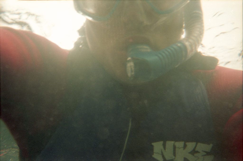 Underwater selfie taken with a waterproof disposable camera