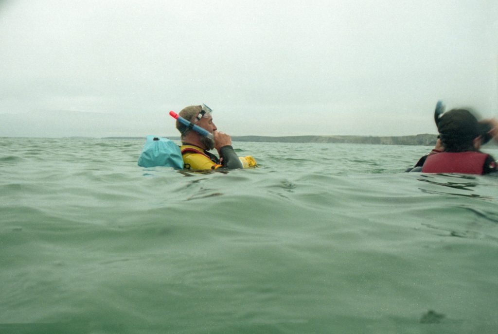 Snorkelling instructor floating on the surface photographed with an Olympus OM-10